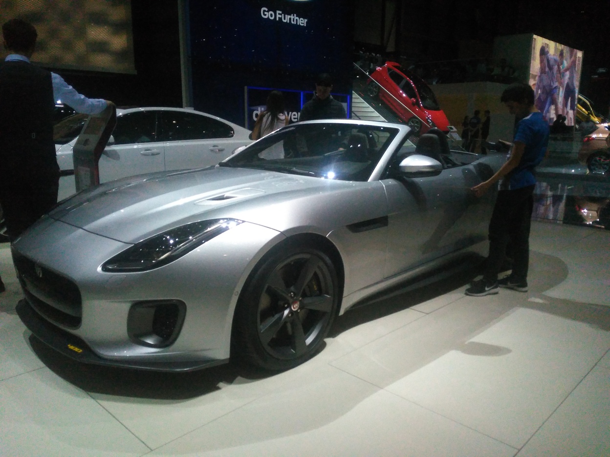 A grey convertible Jaguar