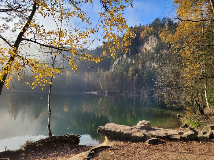 Next to the complex entrance, a small lake prepares the visitors